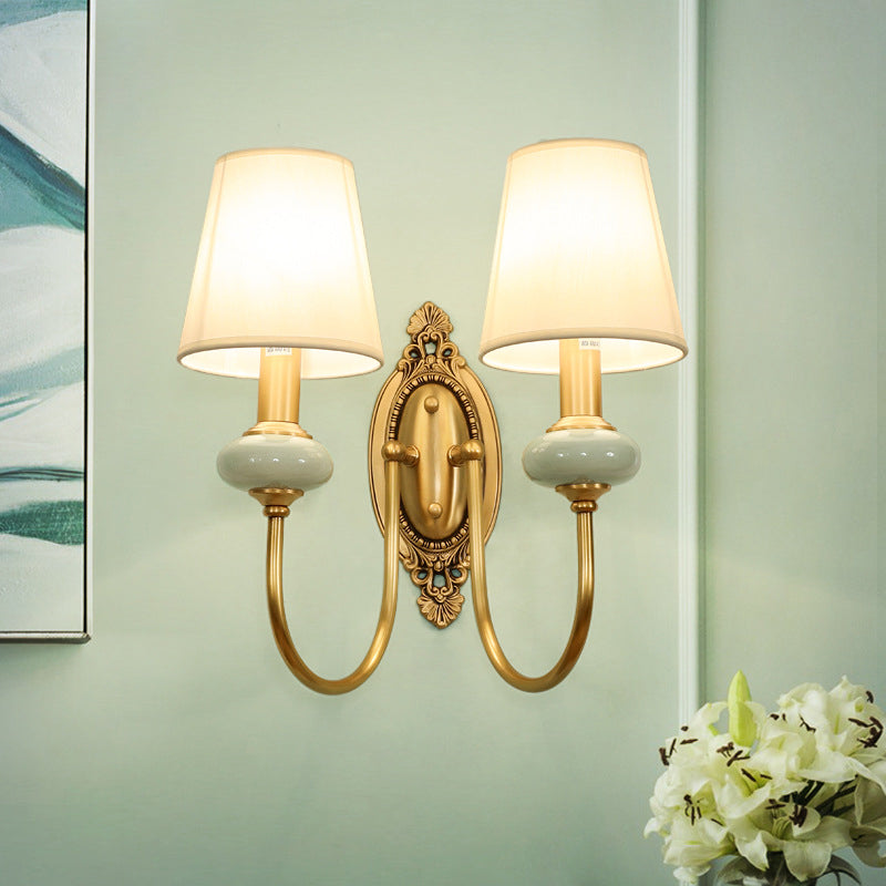 Marianne Gold Swoop Arm Wall Sconce with Cone Shade and Faux Jade