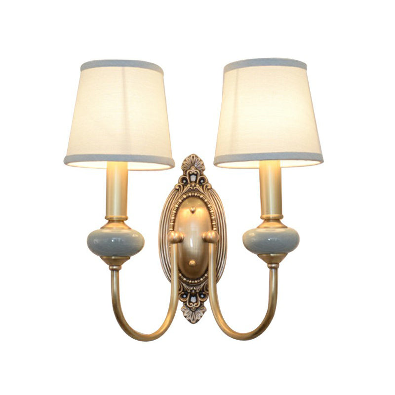 Clémence Brass Swoop Arm Wall Sconce