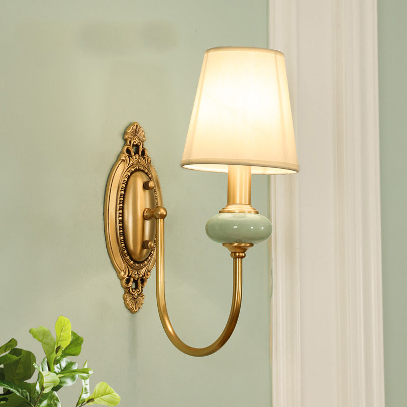 Marianne Gold Swoop Arm Wall Sconce with Cone Shade and Faux Jade