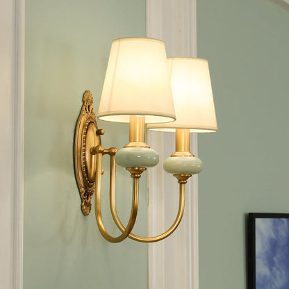 Marianne Gold Swoop Arm Wall Sconce with Cone Shade and Faux Jade