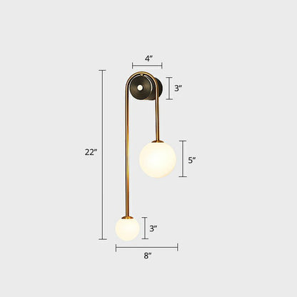 Élodie Brass Arc Wall Sconce with Opal Glass Shades