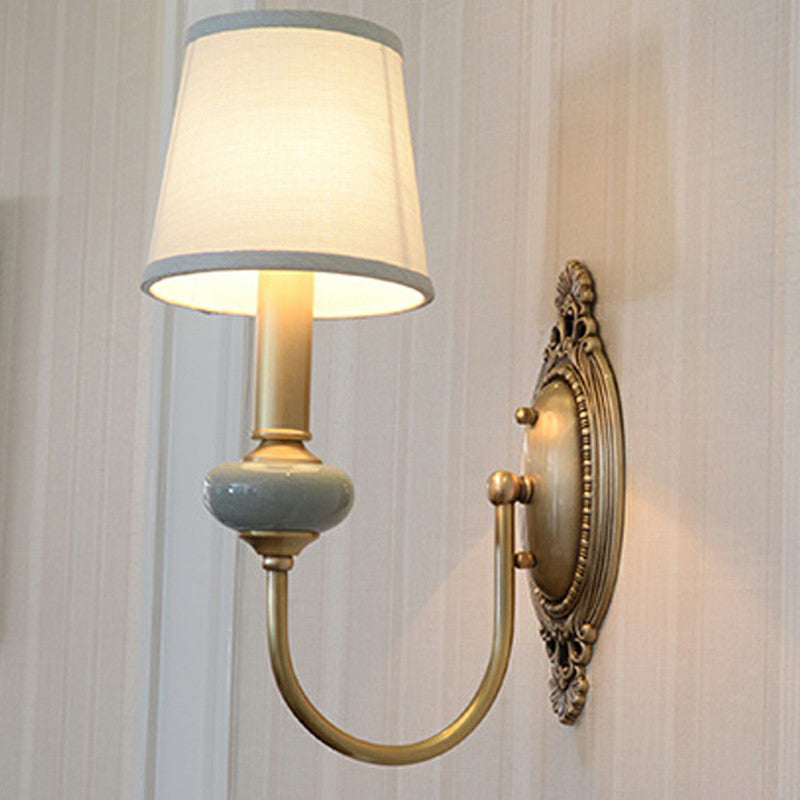 Clémence Brass Swoop Arm Wall Sconce