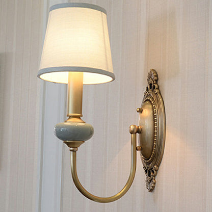 Clémence Brass Swoop Arm Wall Sconce