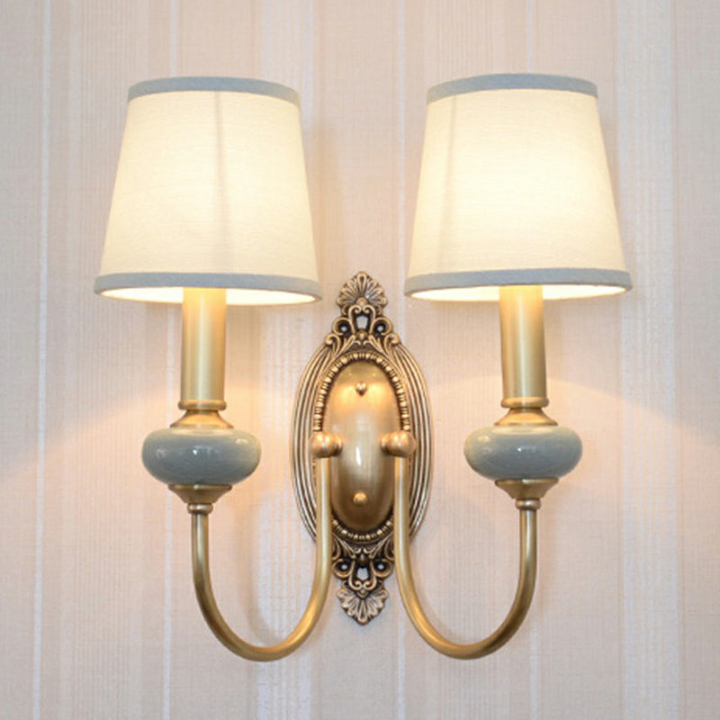 Clémence Brass Swoop Arm Wall Sconce