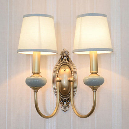 Clémence Brass Swoop Arm Wall Sconce