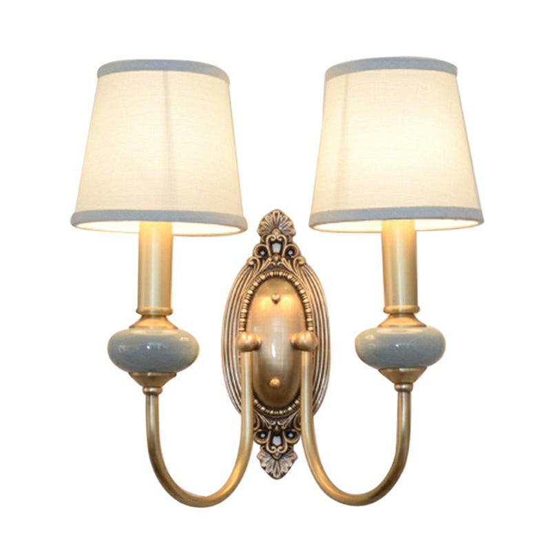 Clémence Brass Swoop Arm Wall Sconce