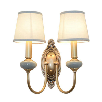 Clémence Brass Swoop Arm Wall Sconce