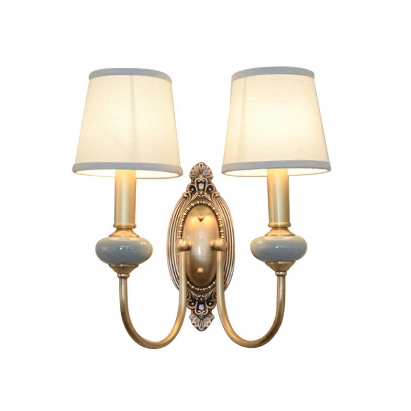 Clémence Brass Swoop Arm Wall Sconce