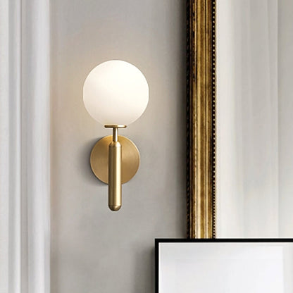 Éloïse Milky Glass Ball Wall Sconce with Brass Arm