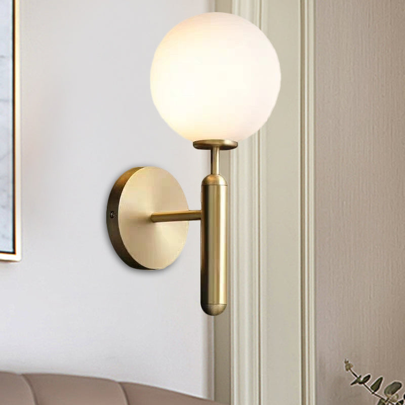 Éloïse Milky Glass Ball Wall Sconce with Brass Arm