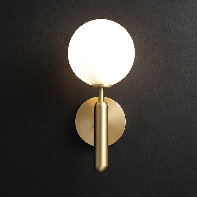 Éloïse Milky Glass Ball Wall Sconce with Brass Arm