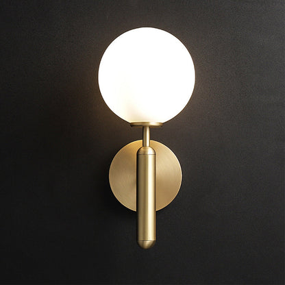 Éloïse Milky Glass Ball Wall Sconce with Brass Arm