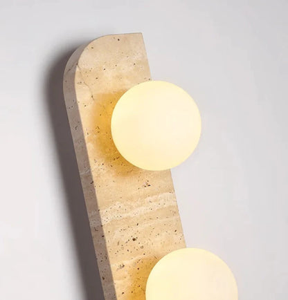Élodie Arco Travertine LED Wall Sconce