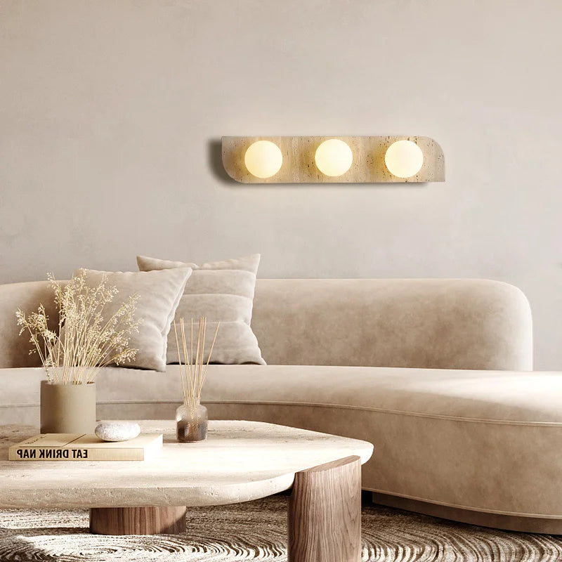 Élodie Arco Travertine LED Wall Sconce