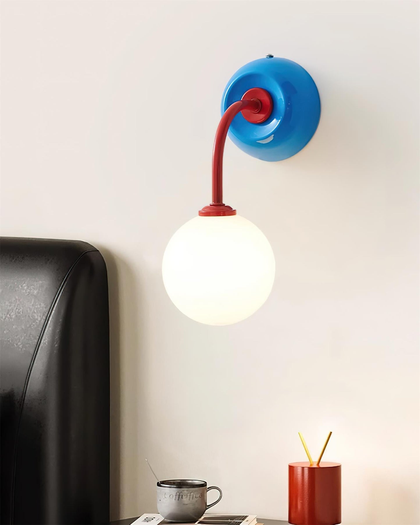 Léonie Retro Globe Wall Lamp with Curved Arm Design
