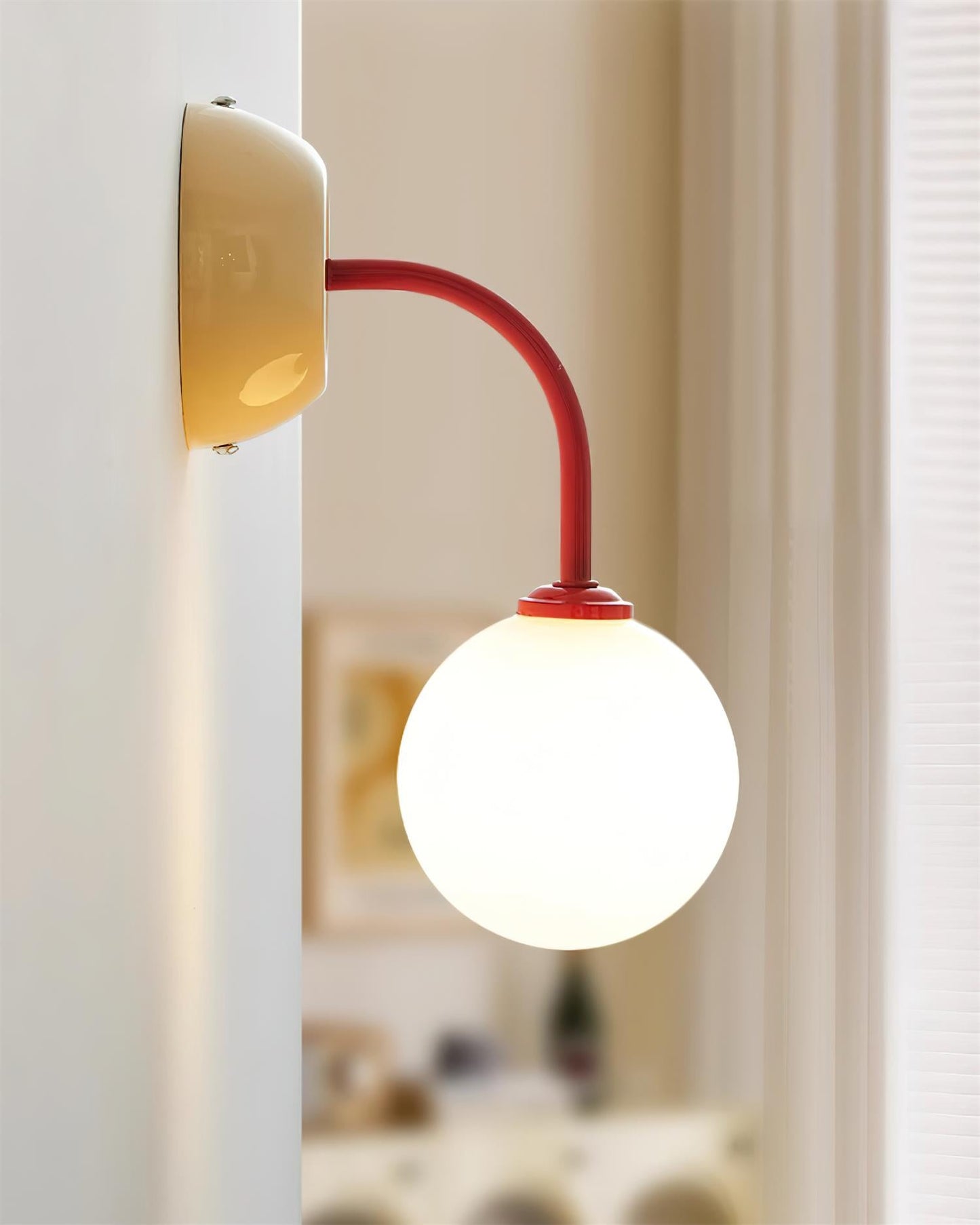 Léonie Retro Globe Wall Lamp with Curved Arm Design