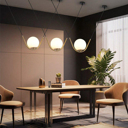 Élodie Glass Brass Orb Pendant Light Luxury Frosted Globe Ceiling Fixture