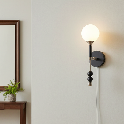 Élodie Lolli Plug-In Wall Lamp with Frosted Glass Orb