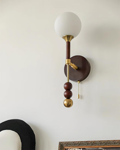 Élodie Lolli Plug-In Wall Lamp with Frosted Glass Orb