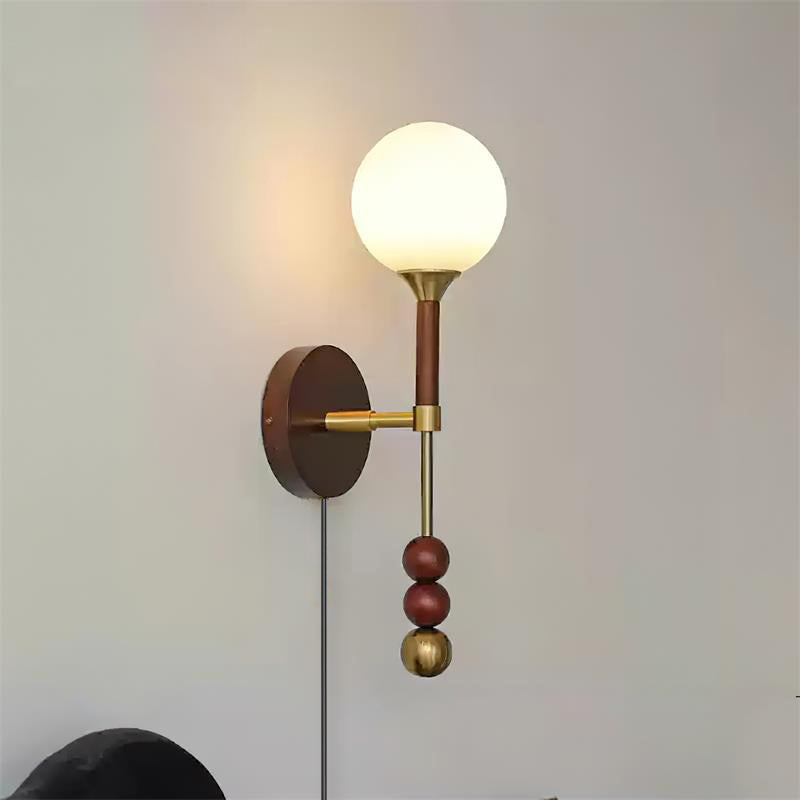 Élodie Lolli Plug-In Wall Lamp with Frosted Glass Orb