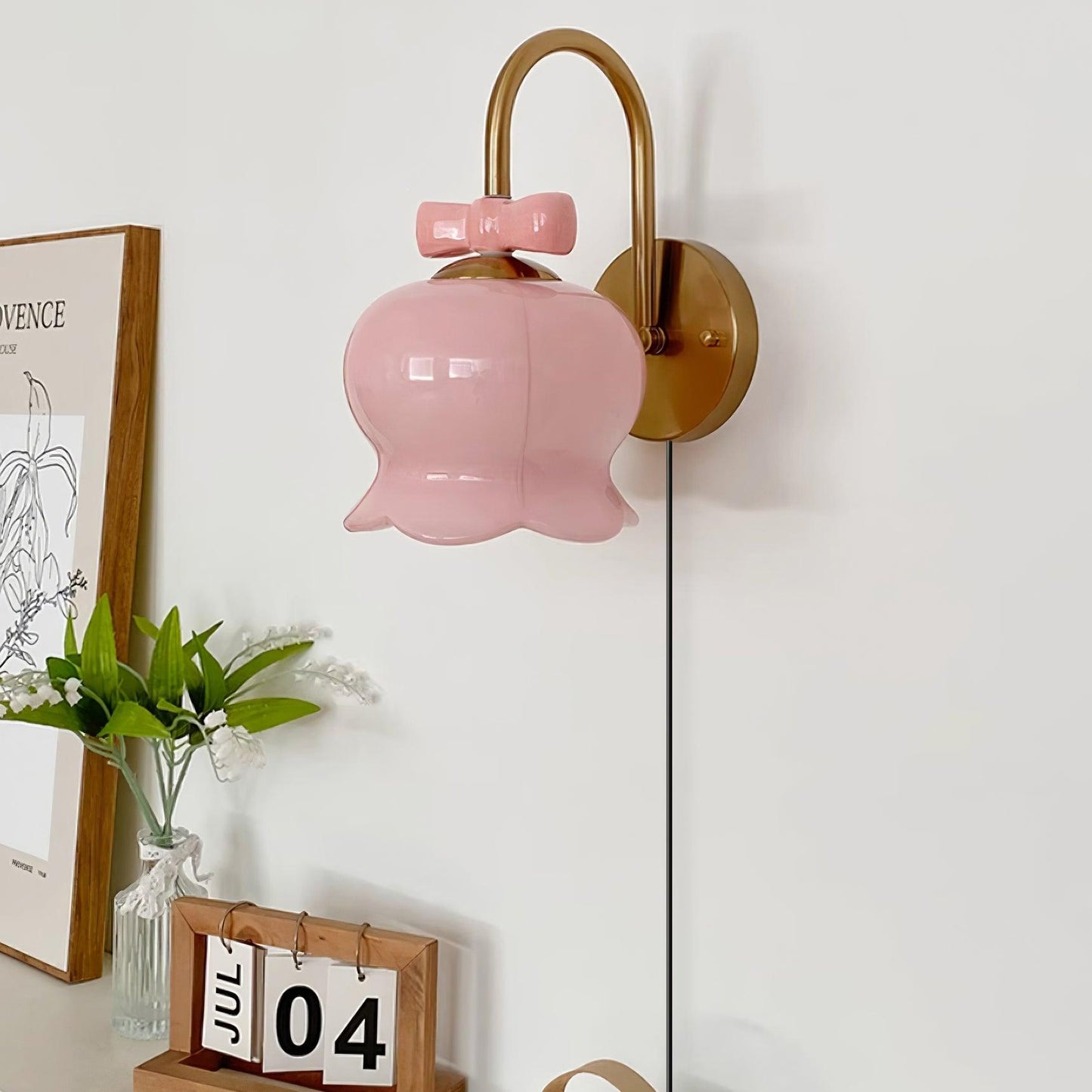 Chloé Bell Plug-In Wall Lamp with Decorative Bow Design