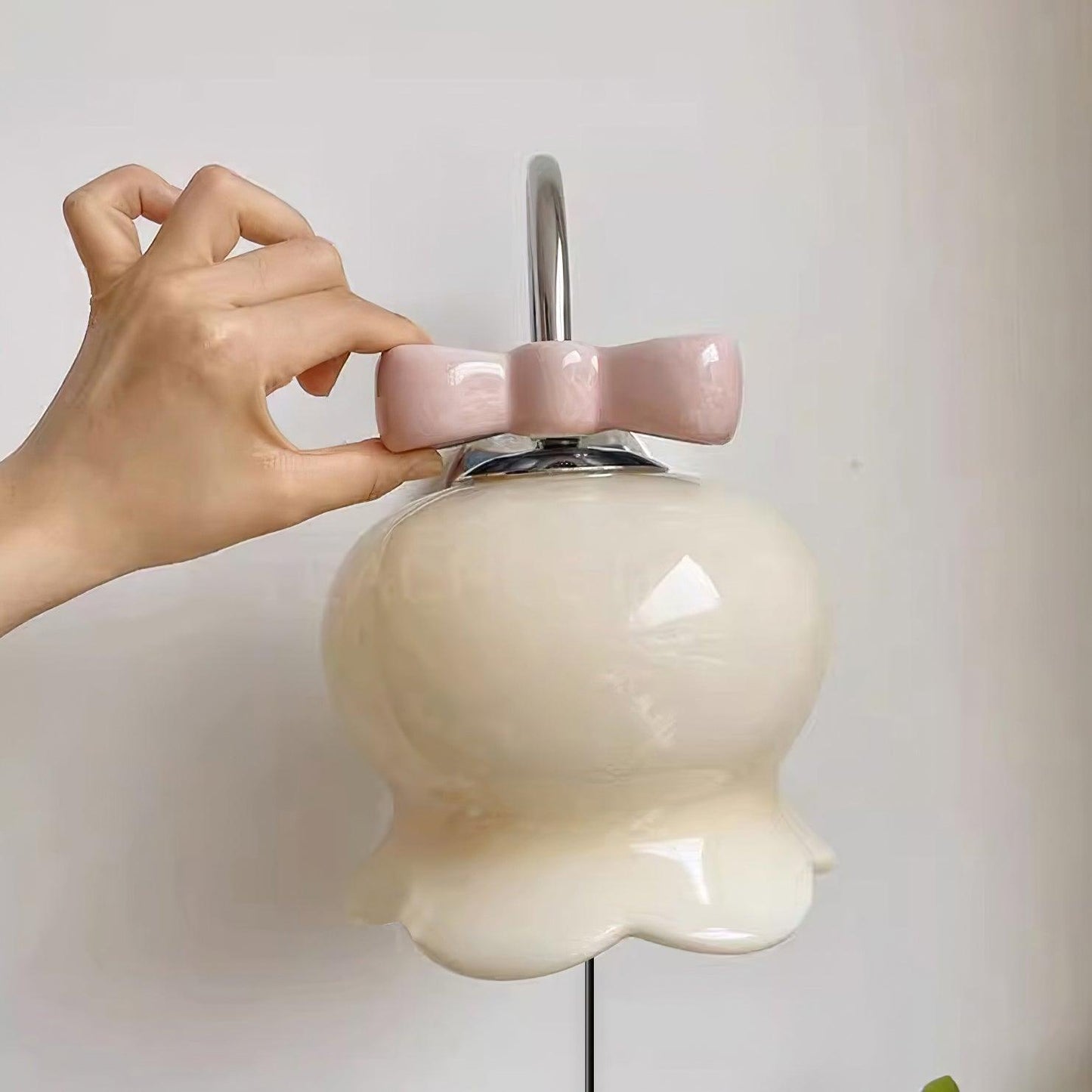 Chloé Bell Plug-In Wall Lamp with Decorative Bow Design