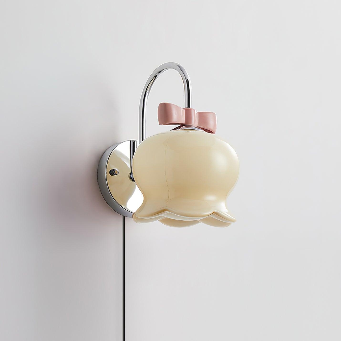 Chloé Bell Plug-In Wall Lamp with Decorative Bow Design