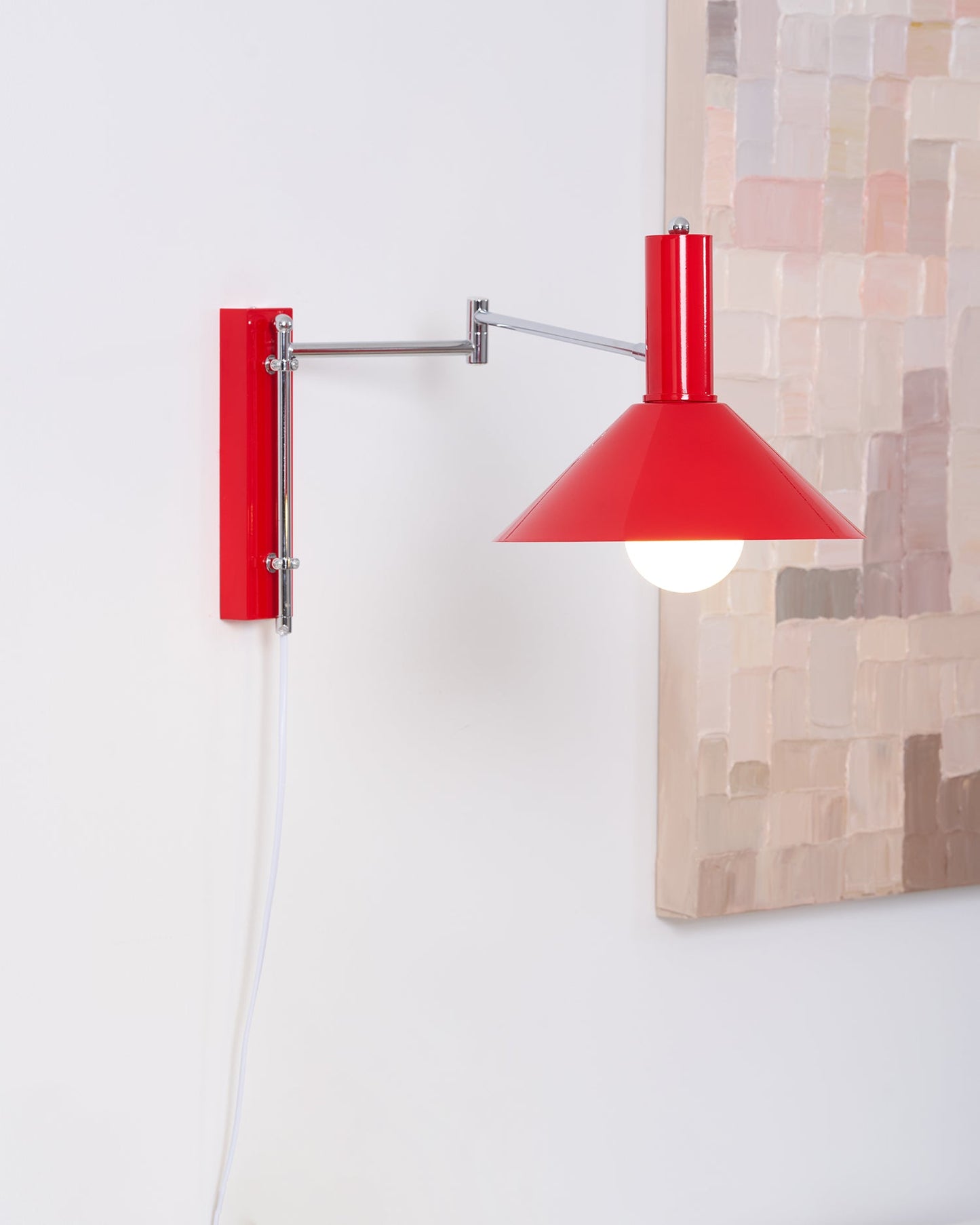 Céline Peak Plug-In Wall Lamp with Adjustable Swivel
