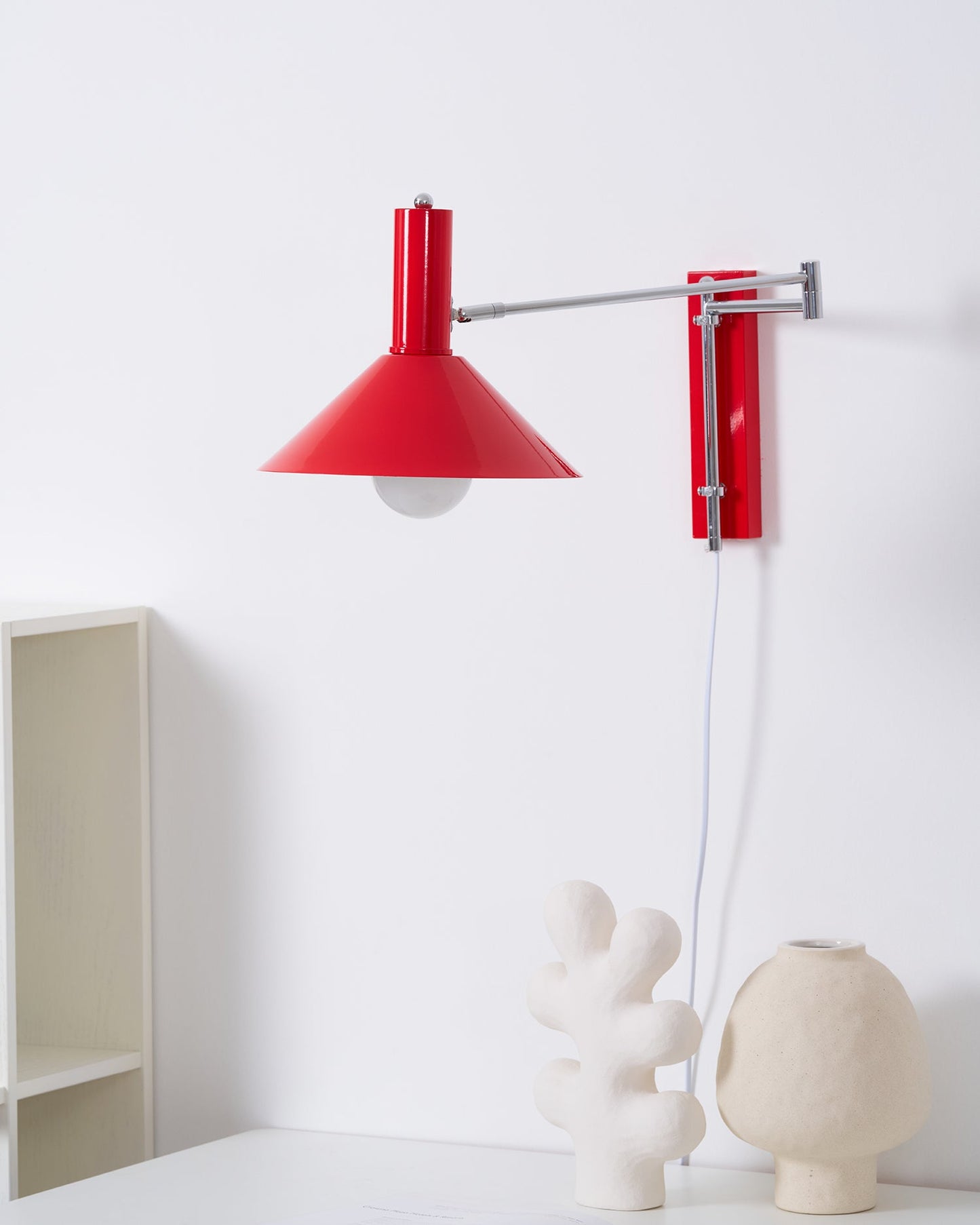 Céline Peak Plug-In Wall Lamp with Adjustable Swivel