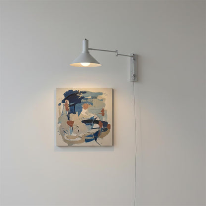 Céline Peak Plug-In Wall Lamp with Adjustable Swivel