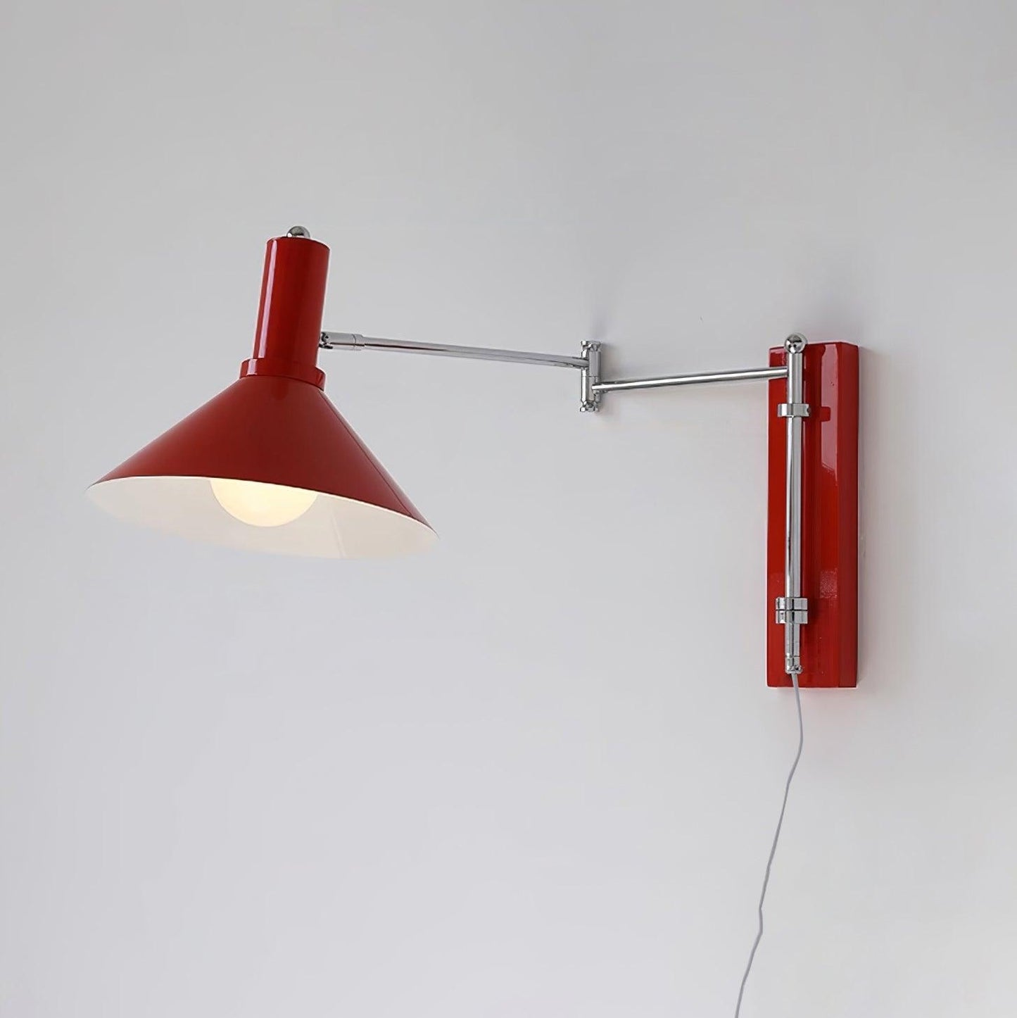 Céline Peak Plug-In Wall Lamp with Adjustable Swivel