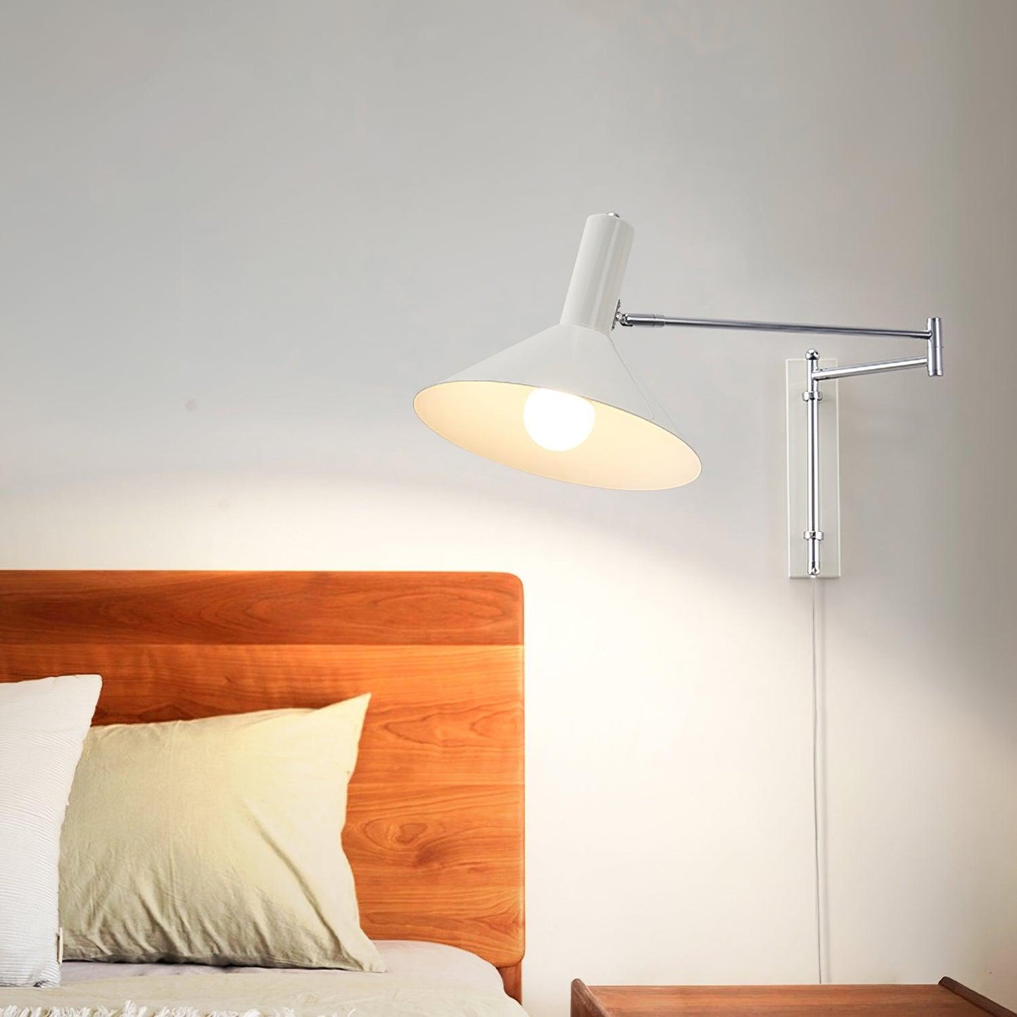 Céline Peak Plug-In Wall Lamp with Adjustable Swivel