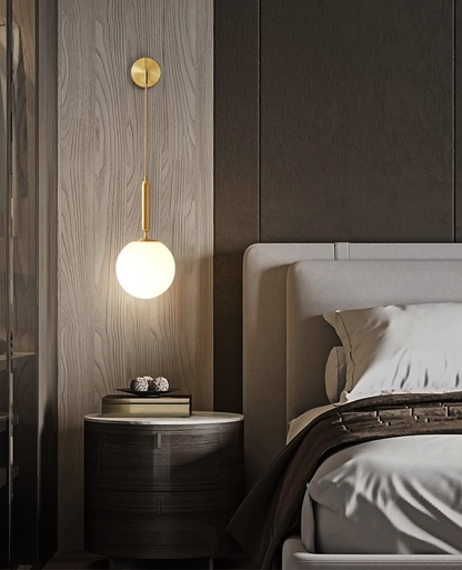 Élise Poiret Brass & Glass Globe Hanging Wall Lamp
