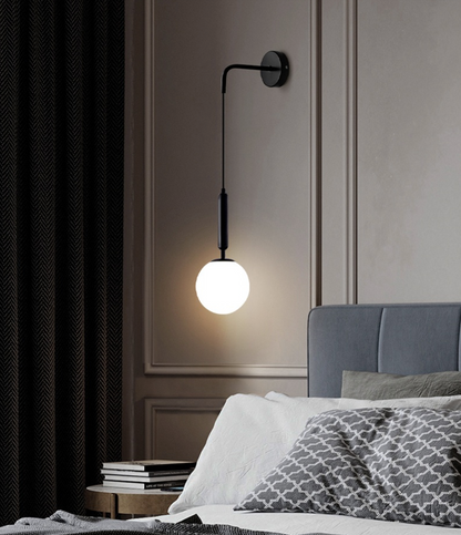 Élise Poiret Brass & Glass Globe Hanging Wall Lamp