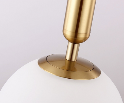 Élise Poiret Brass & Glass Globe Hanging Wall Lamp