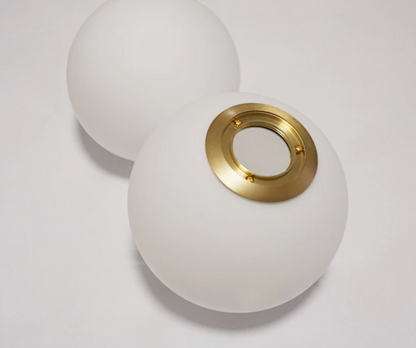 Élise Poiret Brass & Glass Globe Hanging Wall Lamp