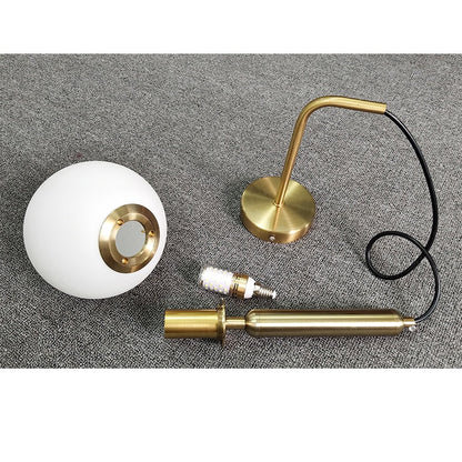 Élise Poiret Brass & Glass Globe Hanging Wall Lamp