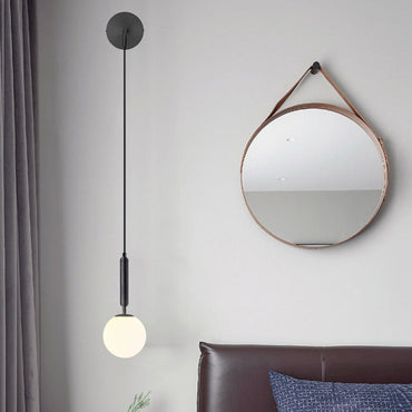 Élise Poiret Brass & Glass Globe Hanging Wall Lamp