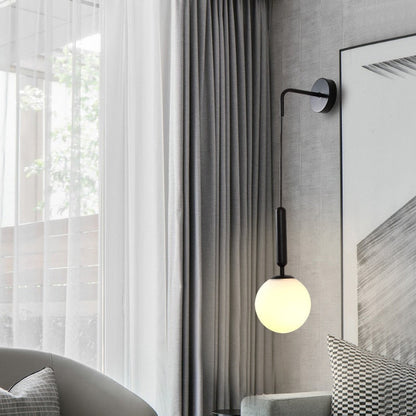 Élise Poiret Brass & Glass Globe Hanging Wall Lamp