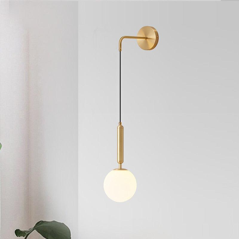 Élise Poiret Brass & Glass Globe Hanging Wall Lamp