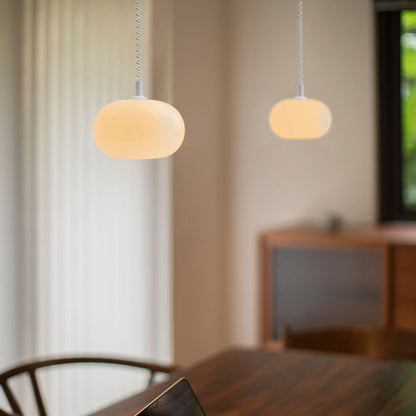 Camille LED-Pendelleuchte mit einziehbarer Feder und weißem Glas, modernes Design
